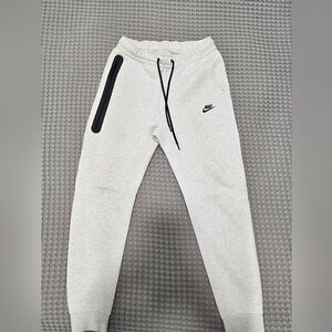 Nike Tech Fleece jogger pants in men’s size Medium.